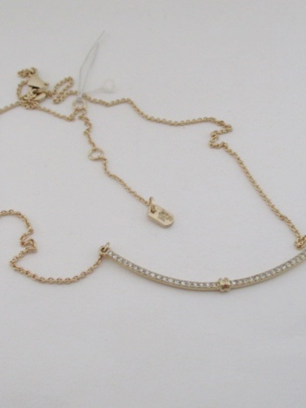 RALPH LAUREN Gol-tone Pave Curved Bar Necklace.